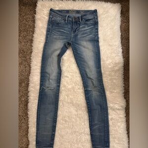 Buckle Women's Distressed Blue Skinny Jeans